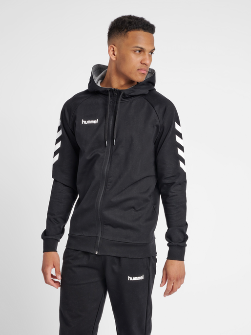 HUMMEL GO COTTON ZIP HOODIE, BLACK, model